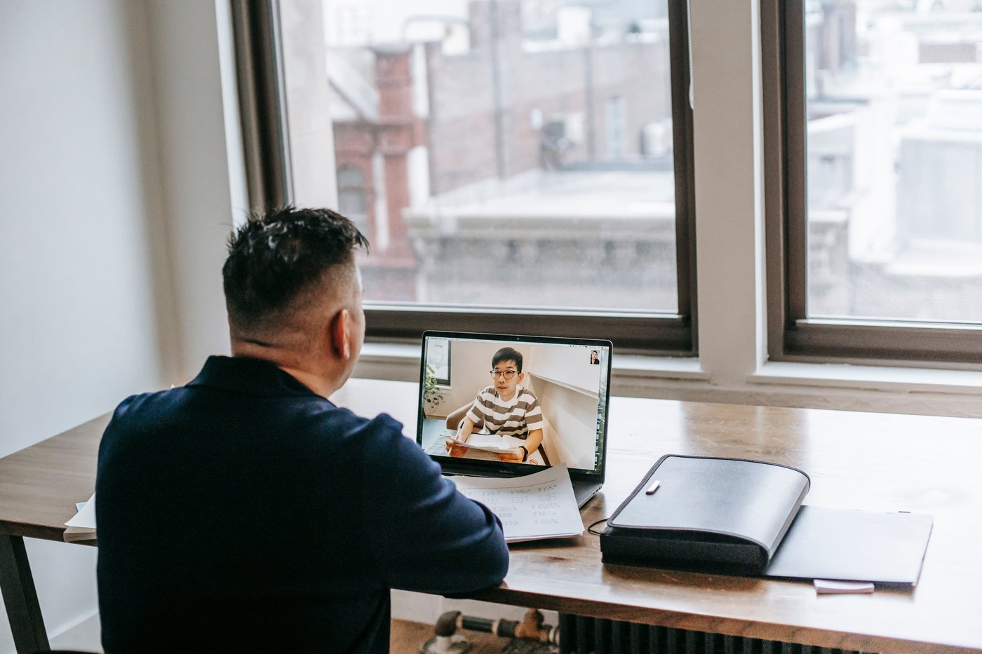 Student joining a live virtual anger management class by video call